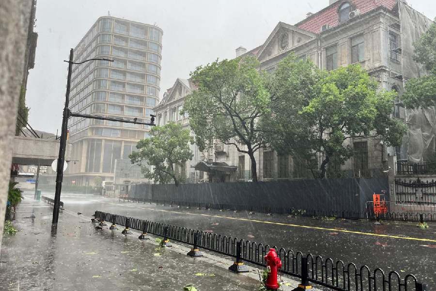 A view of an empty street amid heavy rainfall, after Typhoon Bebinca made landfall in Shanghai, China September 16, 2024.