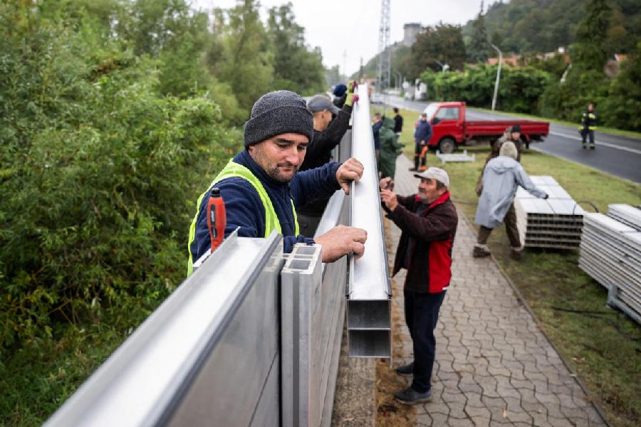 People build a flood protection wall against the flooded Danube in Visegrad, Hungary.