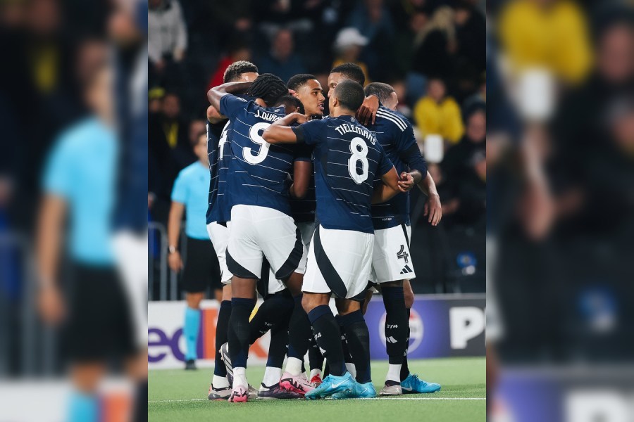 Aston Villa players celebrate after the full-time whistle at Wankdorf Stadium, Switzerland.