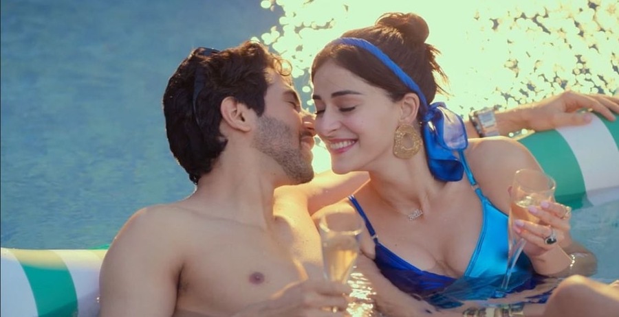 This sleek blue bikini from swimwear label Sa Diosa is one of the most eye-catching outfits from the show. Bae keeps it classy with a blue headband and gold drop earrings as she lounges in the pool with husband Vihaan. 