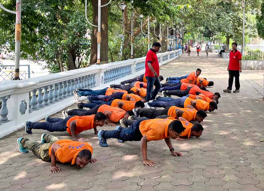 Odisha Disaster Rapid Action Force performs physical exercises in front of Man Of War Jetty on Saturday