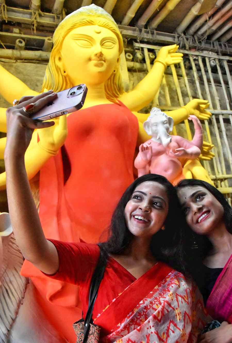 Mahalaya might be eight days away but these two enthusiastic young women reached Kumartuli to take selfies with the goddess