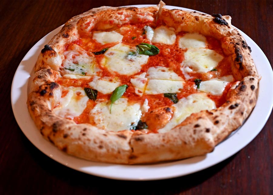 The menu at Fabbrica Originale continues to serve Italian cuisine aiming to transport its patrons to the European food destination. Besides their handmade pizzas like the (in picture) Margherita Con Bufala and regional handmade pasta such as Mafaldine al Tartufo, diners can enjoy starters like Marinated mixed olives, Arancini ‘cacio e pepe’ and more