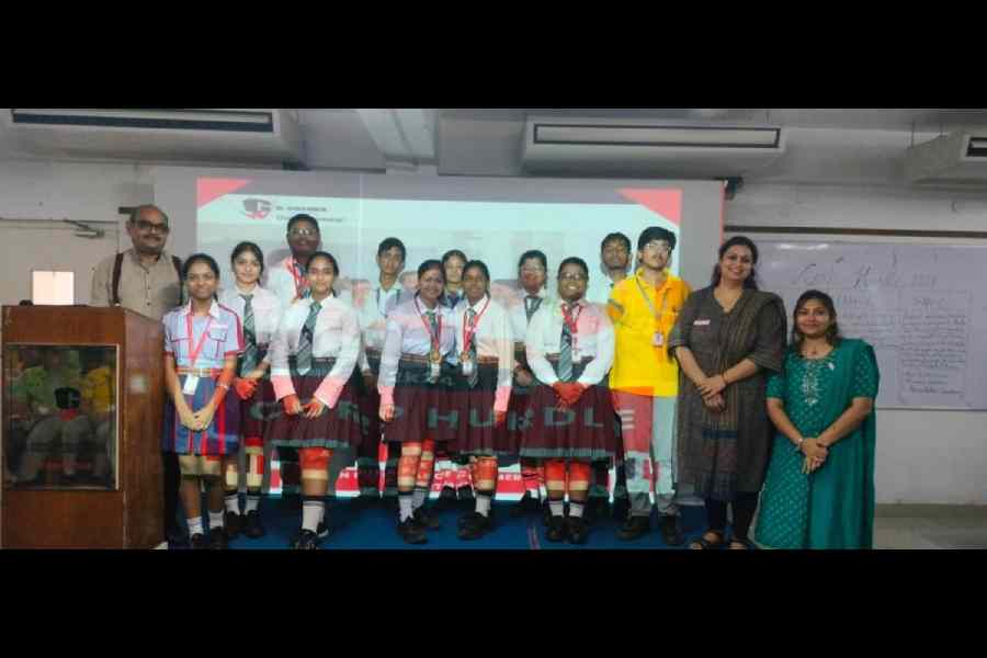 Students take a group picture after the prize distribution ceremony