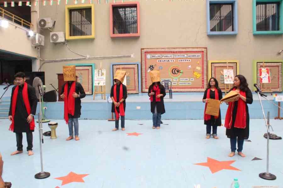 Students of Delhi Public School, Howrah, take part in Nukkad Natak. They present a play of sustainable packaging