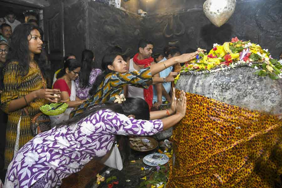 People offer prayers at Mahabhairab Temple on Bengali New Year's day, in Tezpur, Assam.