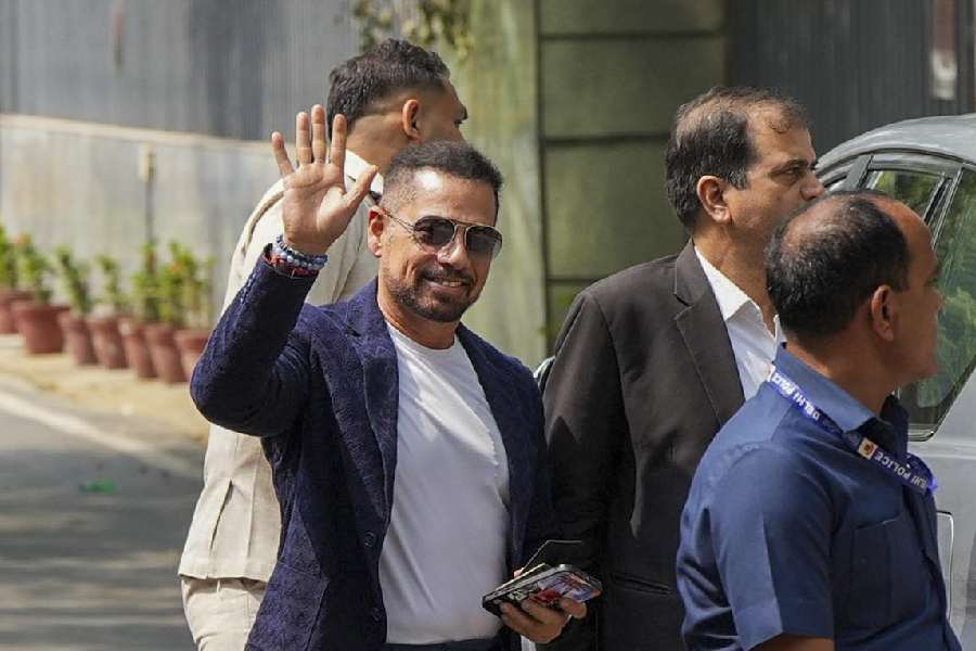 Businessman Robert Vadra arrives at the Enforcement Directorate (ED) office for questioning in a land deal-linked money laundering case, in New Delhi, Tuesday, April 15, 2025.