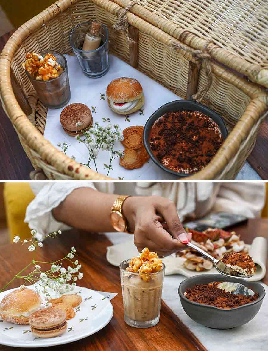 For the desserts, a picnic basket opened to a Tiramisu surprise. A fulfilling bowl of the Italian dessert was served with little treats like a macaron, cream bun and a crispy cookie resembling Kolkata special ‘projapoti’ biscuit