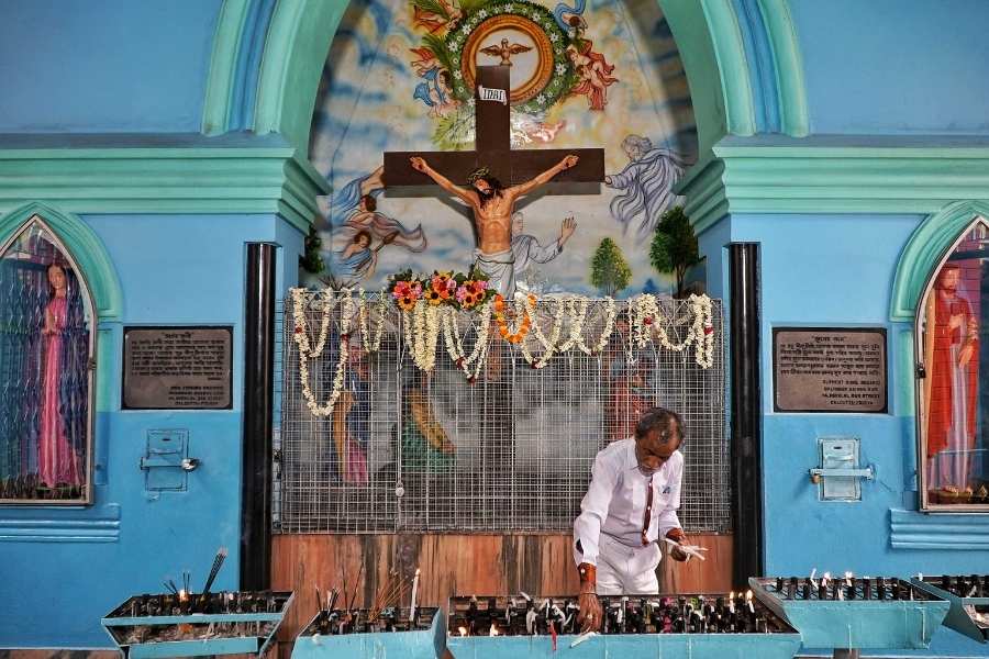 Candles being lit at the St Teresa’s Church