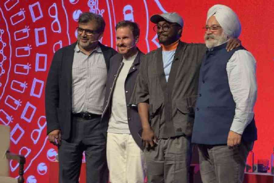 Will.i.am with (left to right) Nakul Duggal, group general manager, automative and industrial and embedded IoT, Qualcomm Technologies, Don McGuire, chief marketing officer, Qualcomm, and Savi Soni, SVP and president, Qualcomm India. Picture: Mathures Paul