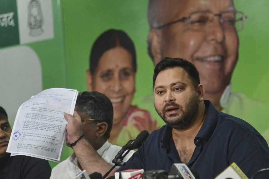 Tejashwi Yadav addressesa news conference in Patna on Saturday.
