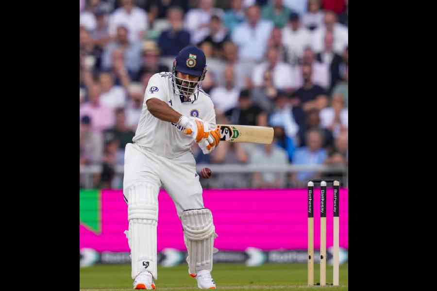 Rishabh Pant plays a shot on day two of the fourth test cricket match between India and England, at the Old Trafford Cricket Ground, in Manchester