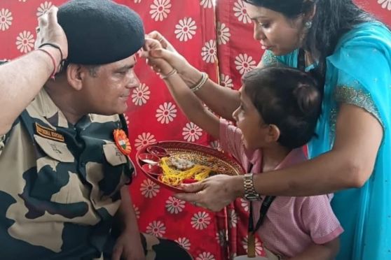 The air was filled with innocent laughter, and emotional smiles as the children tied rakhis on the wrists of the soldiers.