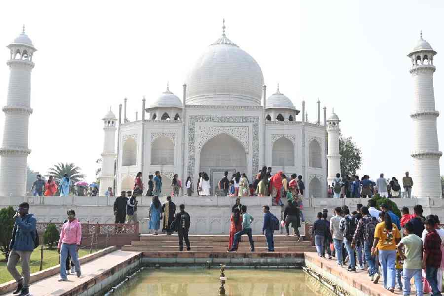 Visitors at the Taj Mahal replica at Eco Park