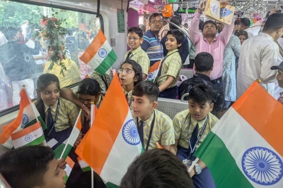 Schoolchildren aboard the new AC rake. The train has a capacity to seat over 1,100 passengers