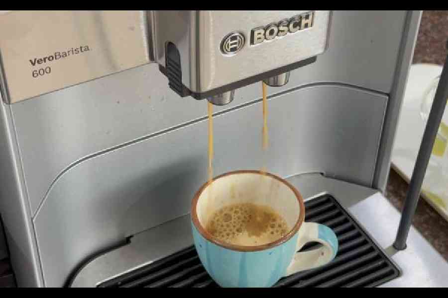 The machine grinds and brews extra-strong coffee in two steps — and as only half the water is used at each step, the coffee produced is less bitter. Picture: Mathures Paul