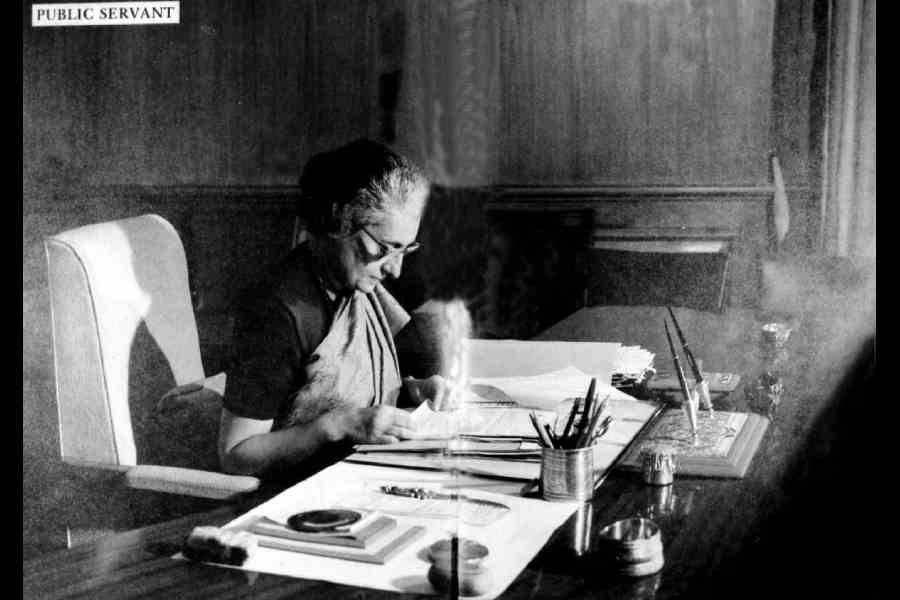 Indira Gandhi at her desk in South Block.