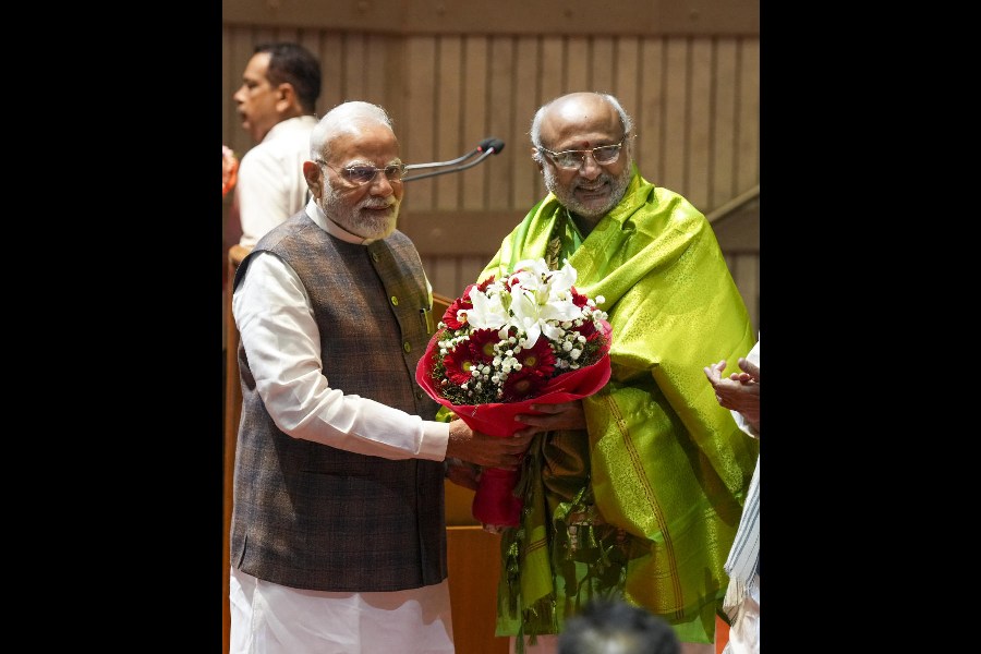 Prime Minister Narendra Modi felicitates CP Radhakrishnan in New Delhi on Tuesday.