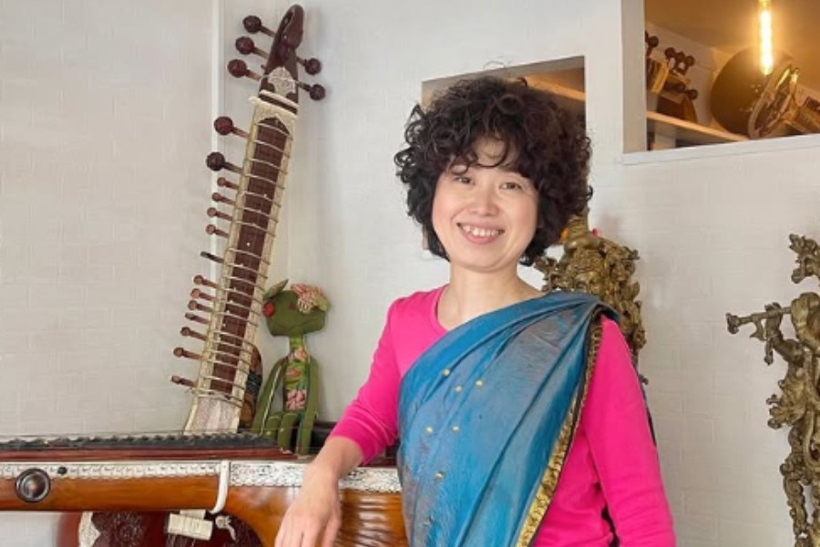 Sachiko wears sari everyday at the restaurant