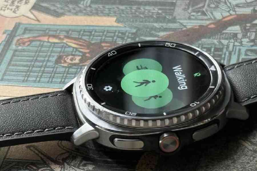 The smartwatch comes with a rotating bezel and Quick Button for easier navigation. Picture: Mathures Paul