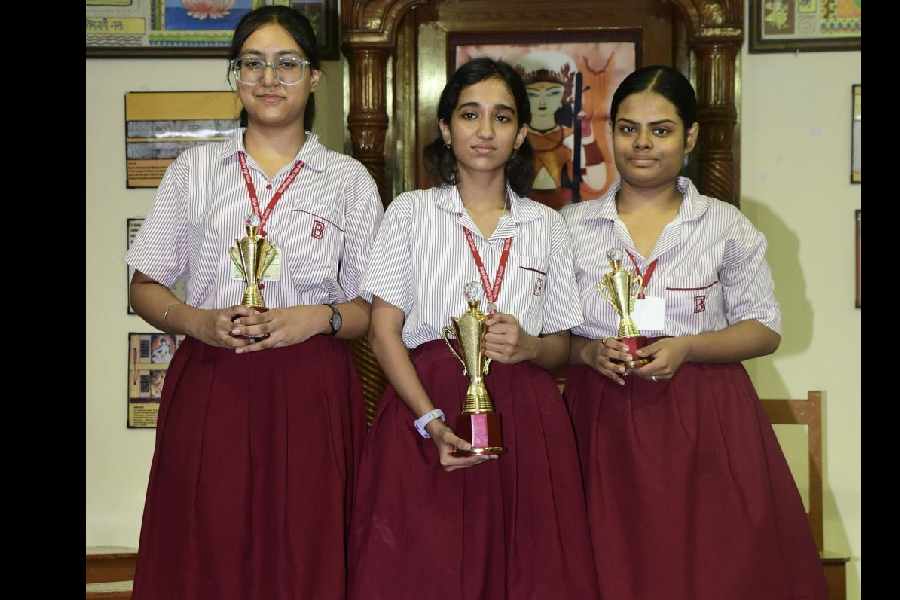 (From left) Nandini Shah, Zunaira Amin, and Shivangi Roy of Bidya Bharati after securing the top positions in the debate