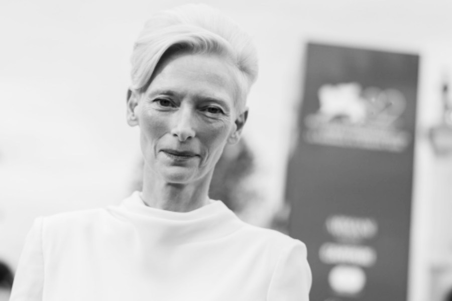British actress Tilda Swinton walked the red carpet in a bespoke black-and-white Chanel outfit.  