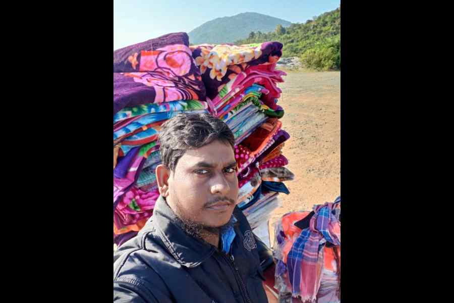 Saheb Sekh with his wares 