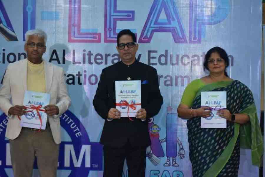 (From left) Sanjoy Chatterjee, founder, Entiovi Technologies; Suborno Bose, chief mentor, IIHM; and Maitreyee Chaudhuri, group director, Institute of Advanced Management; release the AI manifesto at the event on Friday