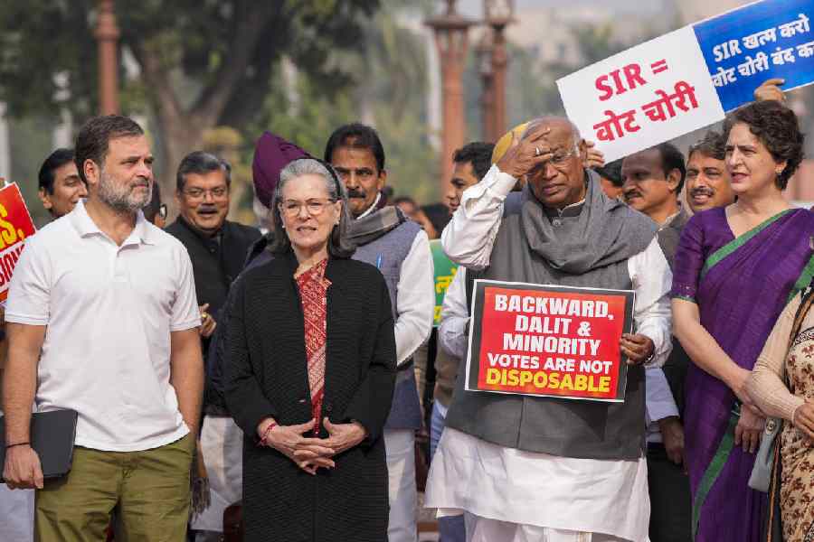 (From left) Congress leaders Rahul Gandhi, Sonia Gandhi, Mallikarjun Kharge and Priyanka Gandhi Vadra during a protest against the SIR at Parliament complex on Tuesday.