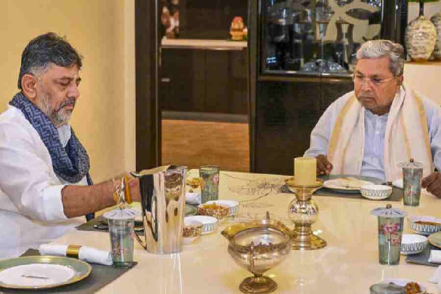 Karnataka chief minister Siddaramaiah (right) with deputy chief minister DK Shivakumar during a breakfast meeting at the latter's residence in Bengaluru on Tuesday. 