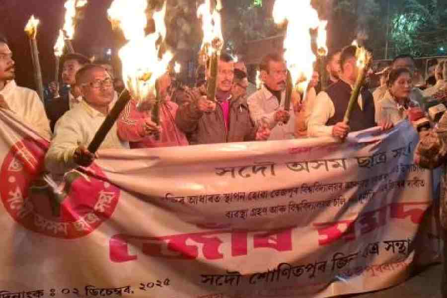 The torchlight rally led by AASU in Tezpur town on Tuesday