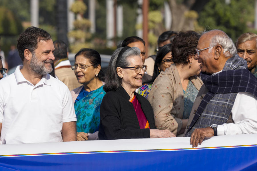 LoP in the Lok Sabha and Congress leader Rahul Gandhi, left, party leader Sonia Gandhi, center, and party President Mallikarjun Kharge during a protest against Special Intensive Revision (SIR) during the Winter Session, at Parliament complex, in New Delhi, Wednesday, Dec. 3, 2025.