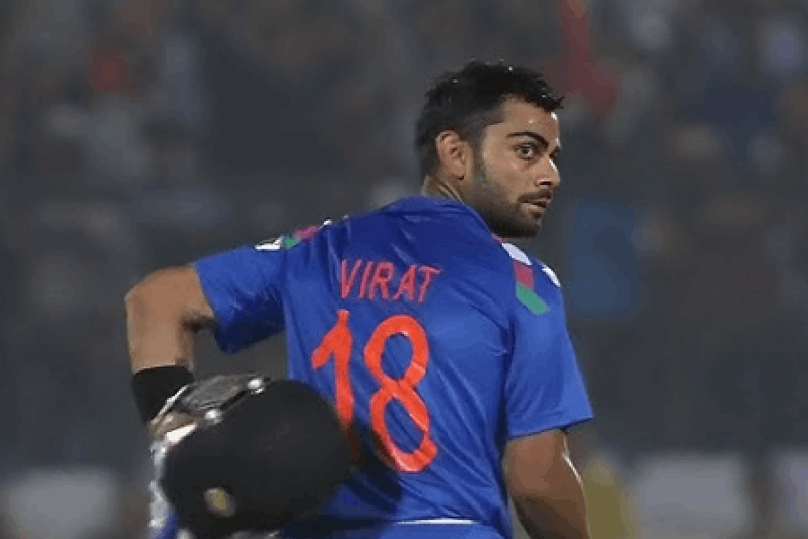 Virat Kohli celebrates his 100 vs Australia in Jaipur 2013
