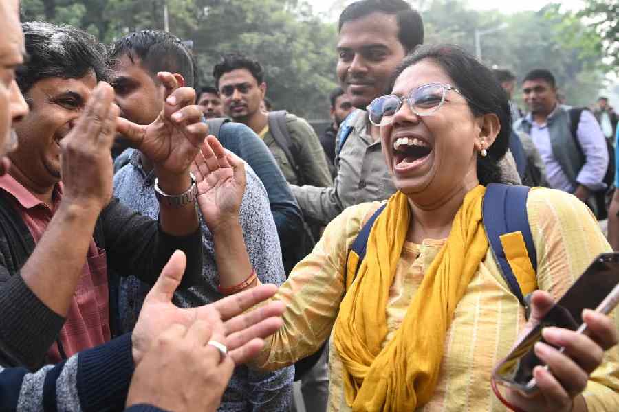 Primary teachers celebrate after the Calcutta High Court judgment on Wednesday.