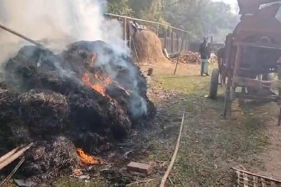A haystack that was set on fire during the clash between two groups at Mukuldangi village in North Dinajpur on Wednesday.
