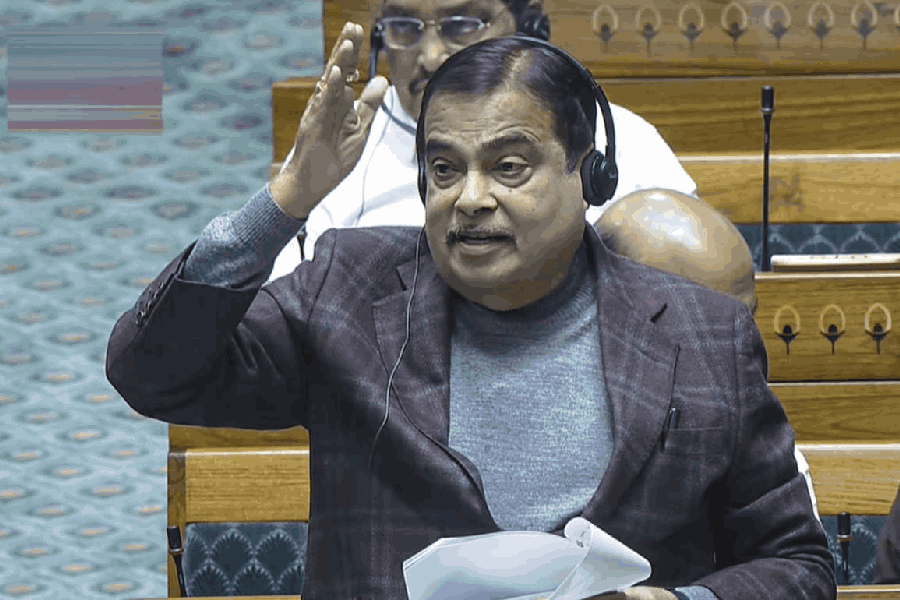 Union Minister Nitin Gadkari speaks in the Lok Sabha during the Winter session of Parliament, in New Delhi, Thursday, Dec. 4, 2025.