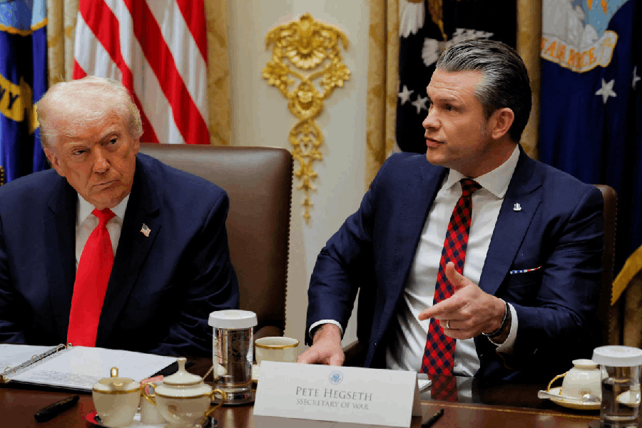 U.S. Secretary of Defense Pete Hegseth speaks during a cabinet meeting with U.S. President Donald Trump at the White House in Washington, D.C., U.S., December 2, 2025.