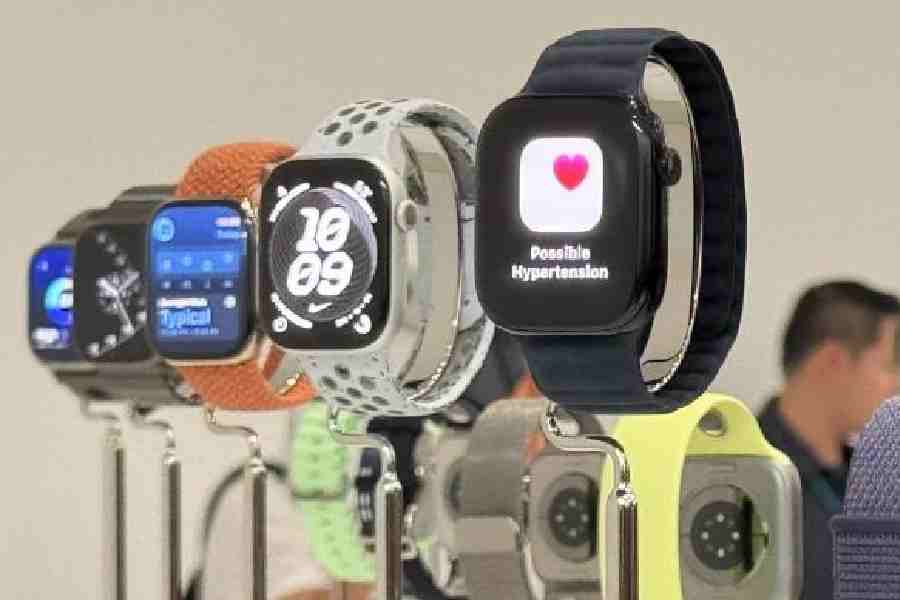 Apple watches display the hypertension notification.