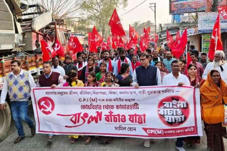 CPM state secretary Md Salim (in black vest), with other party leaders and workers, at the Bangla Bachao Yatra in Mathurapur, Malda district, on Friday. Picture by Soumya De Sarkar
