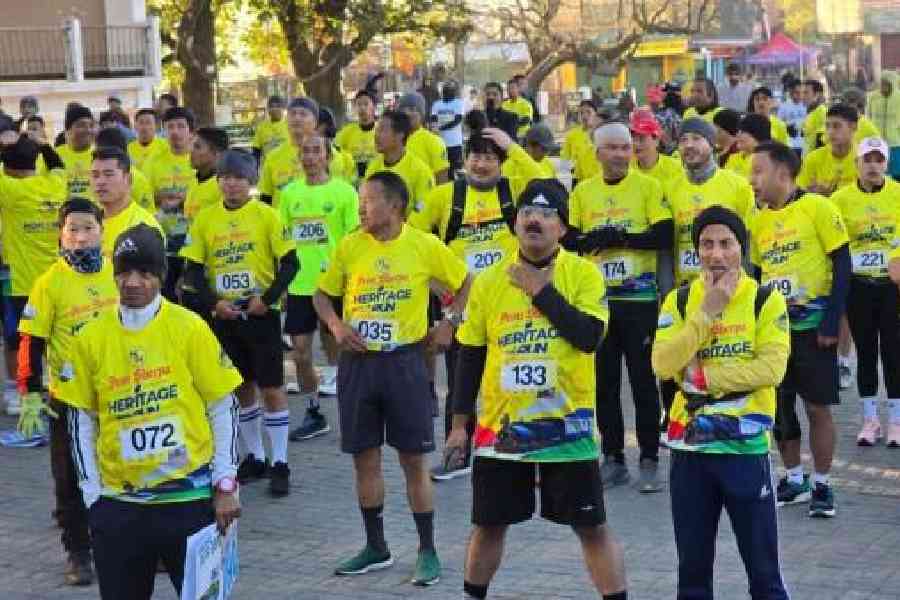 Participants in the ‘Iron Sherpa Heritage Run’ organised by the Darjeeling Himalayan Railway to celebrate the 26th anniversary of its Unesco world heritage site recognition at Chowrasta in Darjeeling on Friday. Pictures courtesy: DHR