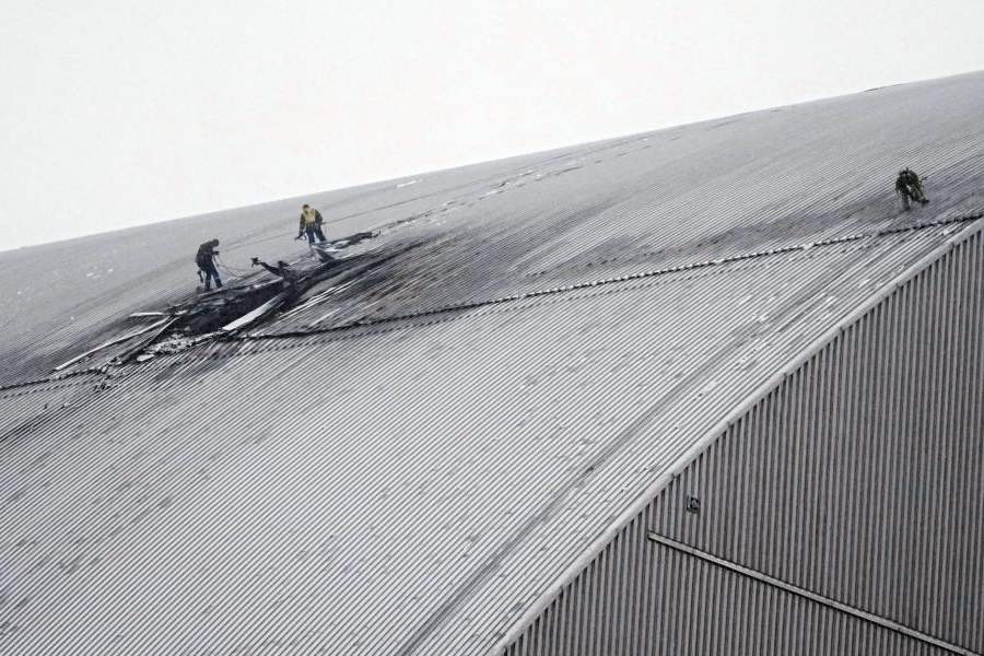 A view of the containment vessel that protects the remains of reactor number four at the former Chernobyl nuclear power plant and built to contain radiation, after a drone attack in Chernobyl, Ukraine, Friday, Feb. 14, 2025.