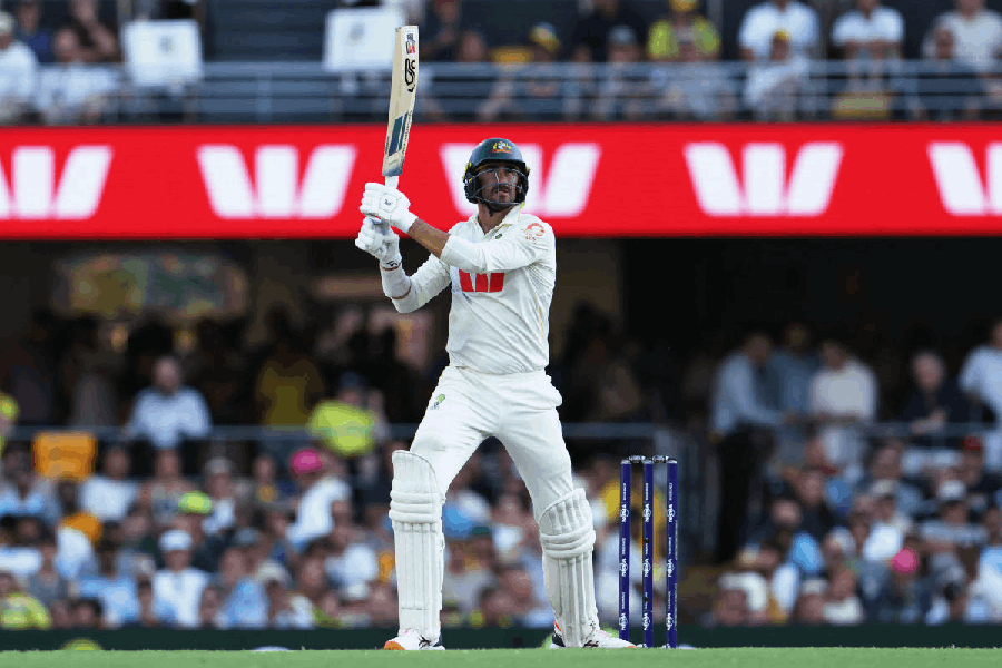 Australia's Mitchell Starc in action before losing his wicket, caught out by England's Ben Stokes off the bowling of Brydon Carse.