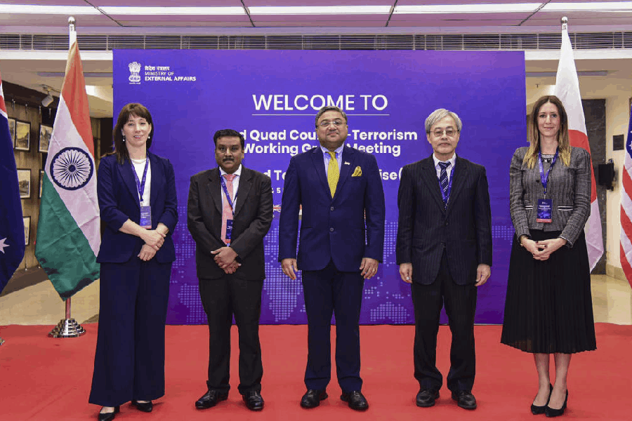 In this image posted on Dec. 4, 2025, Secretary (West) Ambassador Sibi George, centre, at the 3rd QUAD Counter Terrorism Working Group Meeting, in New Delhi.