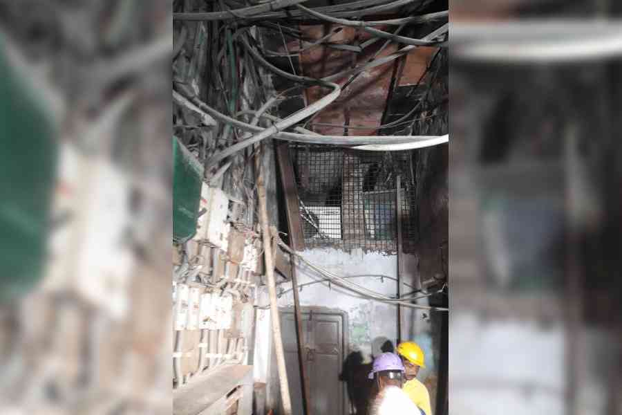 Restoration work in progress at the three-storey building in Bowbazar on Sunday. Picture by Bishwarup Dutta