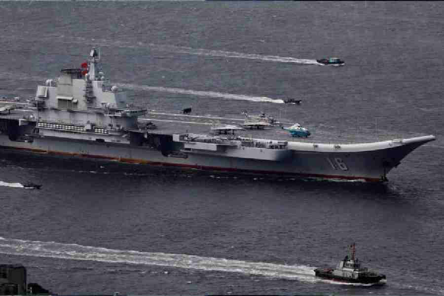 The Liaoning, China’s first aircraft carrier, sails into Hong Kong on July 7, 2017.