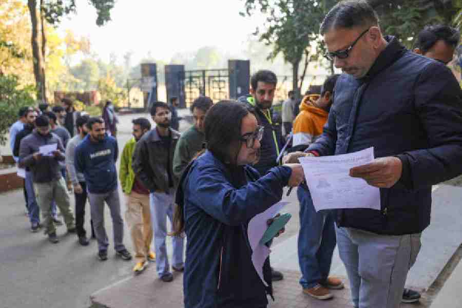 Candidates before appearing for the CCE in Jammu on Sunday. 