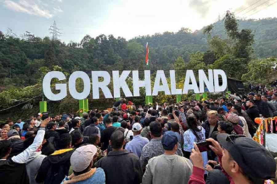 Residents of the Toongsoong tea garden gather for the Gorkhaland bridge inauguration ceremony on the outskirts of Darjeeling on Sunday