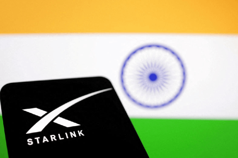 The Starlink logo is seen in front of the Indian flag in this illustration taken.