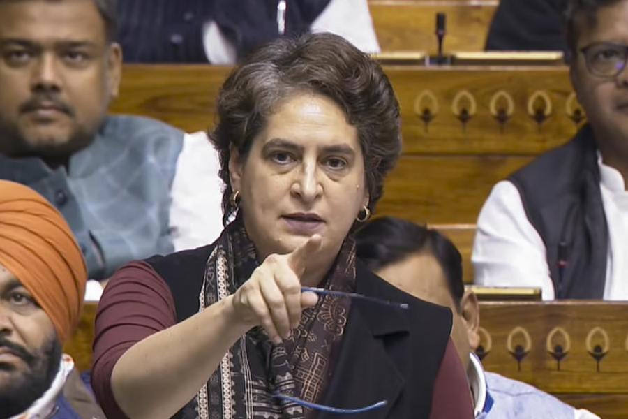 Congress MP Priyanka Gandhi Vadra speaks in the Lok Sabha during the Winter session of Parliament, in New Delhi, Monday, Dec. 8, 2025.