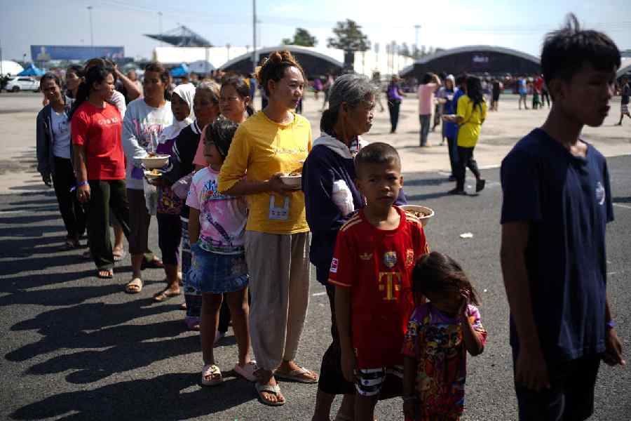 Displaced people queue for food at a temporary shelter amid deadly clashes between Thailand and Cambodia along a disputed border area, in Buriram province, Thailand, December 9, 2025. Reuters picture